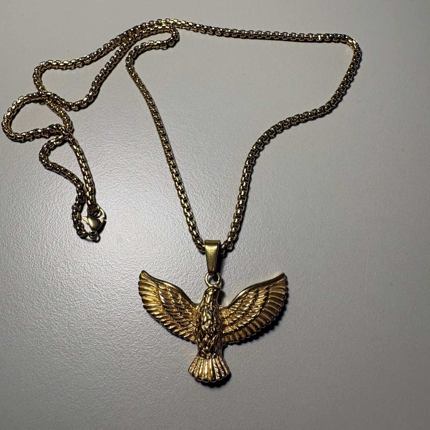 Collar ave fenix bañado en oro 18k