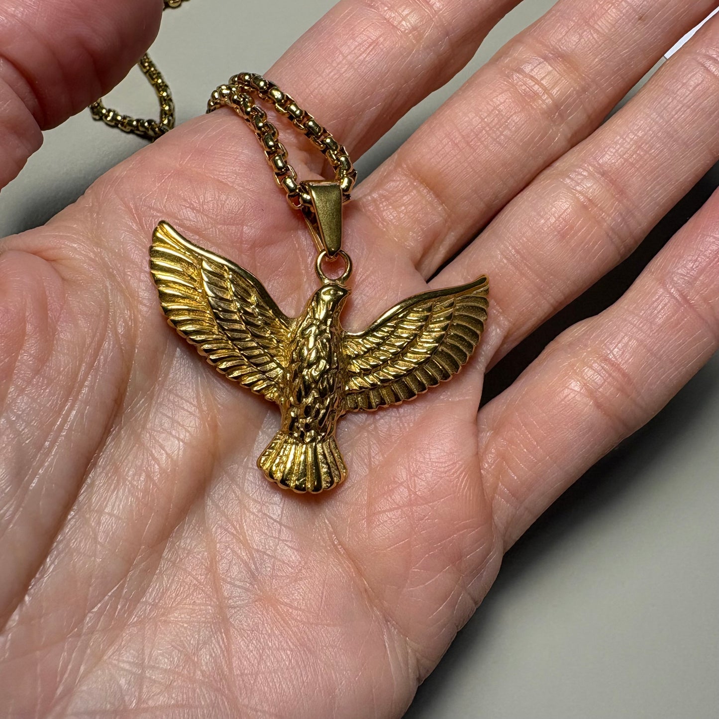 Collar ave fenix bañado en oro 18k