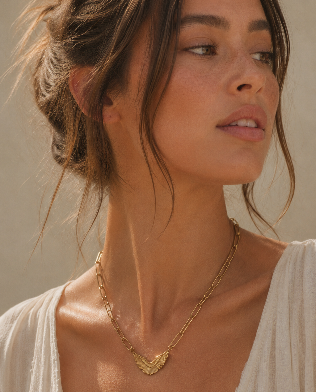 collar alas Kanui banado en oro 18k